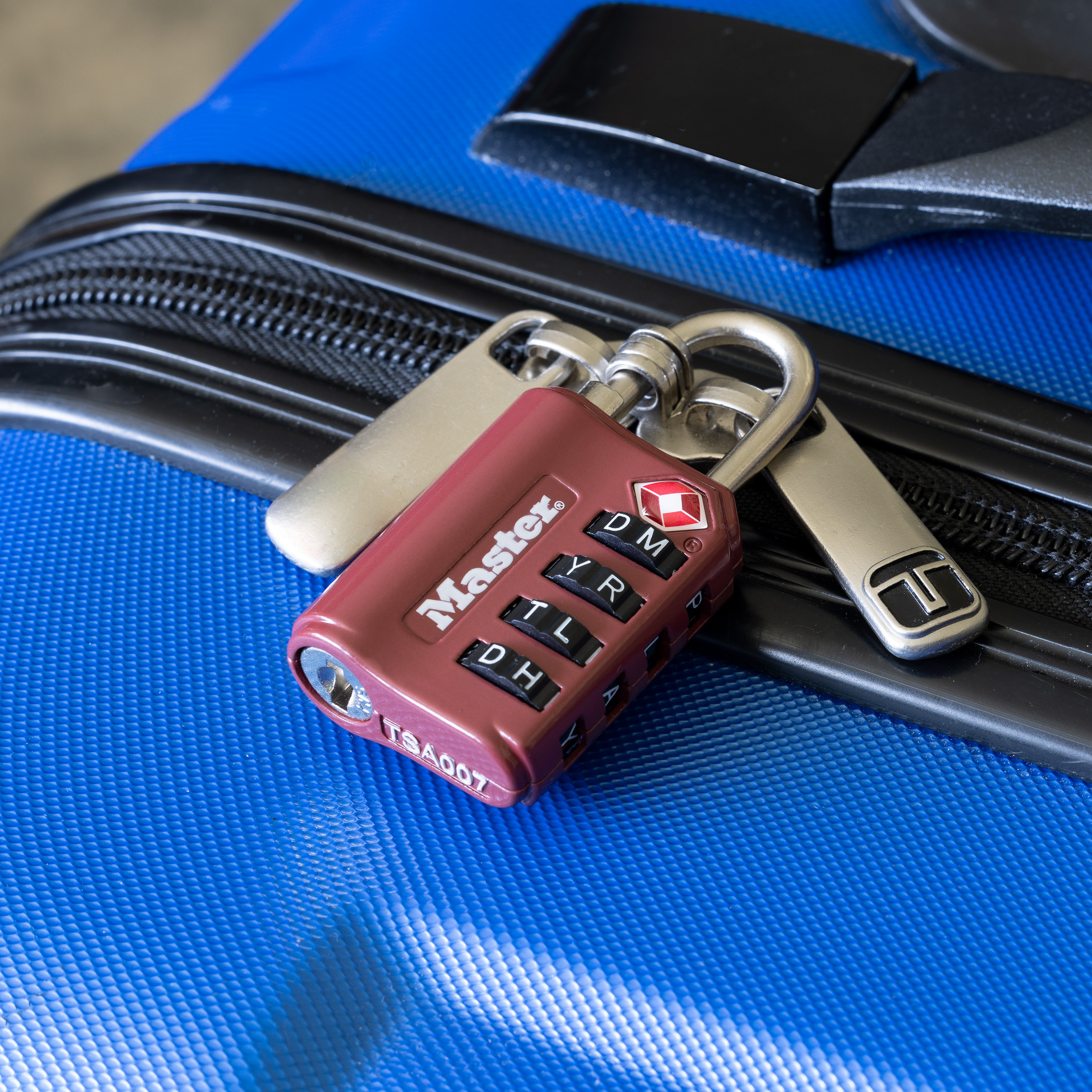 Close-up of a lock on a piece of luggage