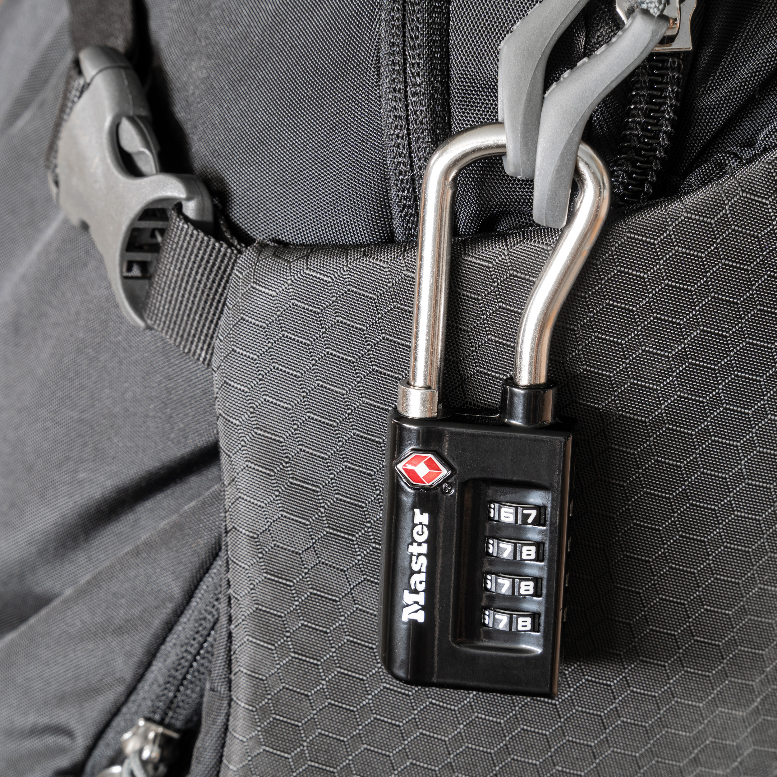 Master Lock on Black Backpack